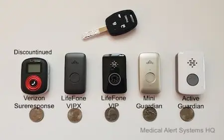 5 different medical alert devices that use Verizon side-by-side, with key fob and quarters for size comparison